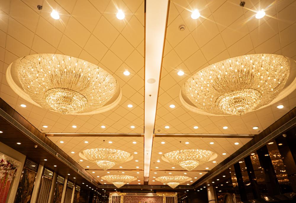 Wide shot of decorated wedding stage with seating arrangement at Swayamvar and ramayan Banquet banquet hall